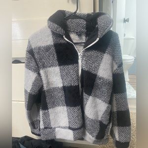 Size small zip up jacket. Only worn a couple times